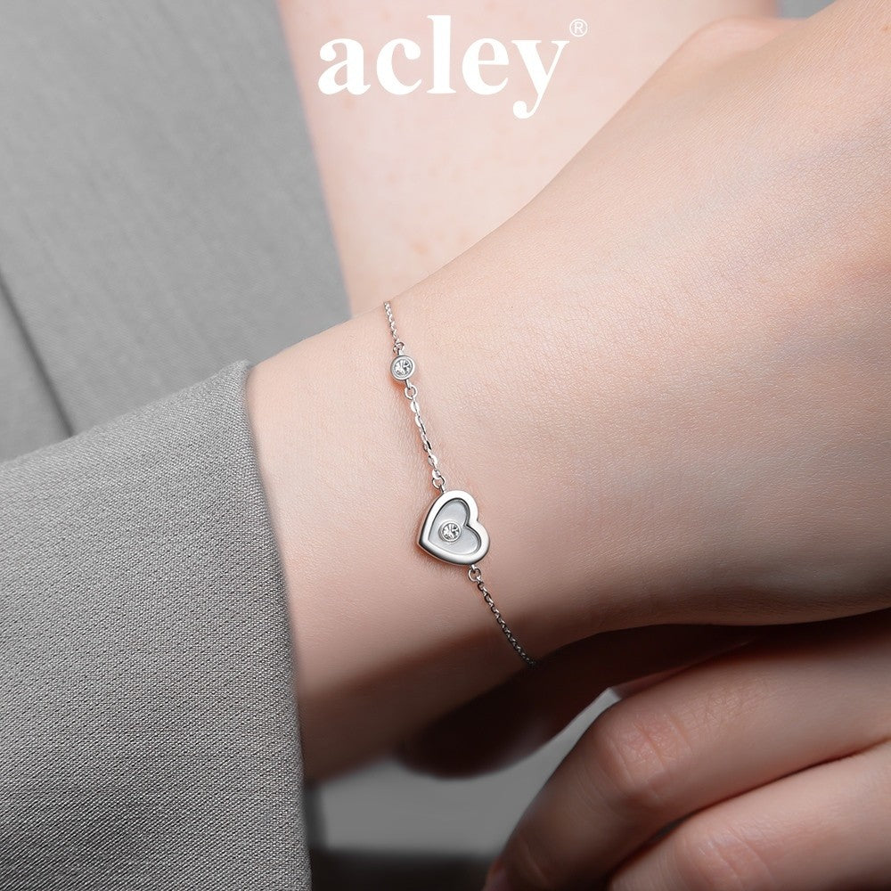 Lắc tay bạc S925 hình trái tim xà cừ trắng đính đá zircon 5A