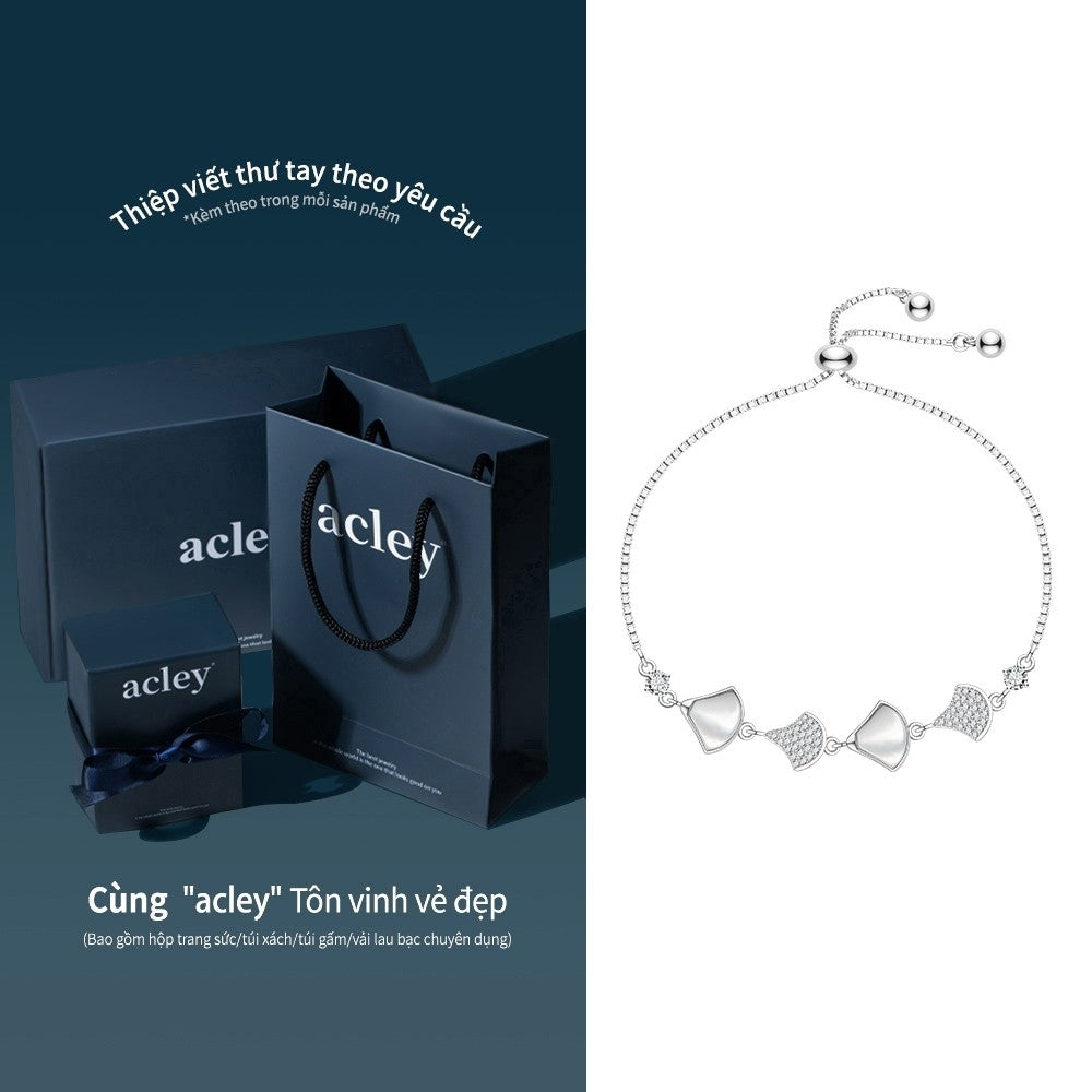 Lắc tay hợp kim đồng xà cừ trắng dáng cánh hoa
